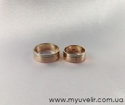 Классические обручальные кольца с камнями